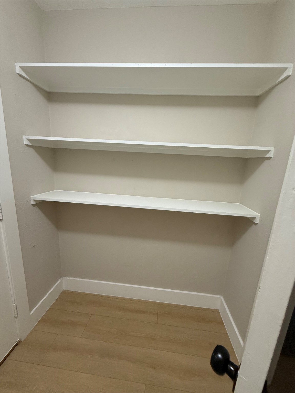 3819 Banks Ridge Lane Katy, TX 77449 - Photo 17 of 19 a view of small space with racks on the wall