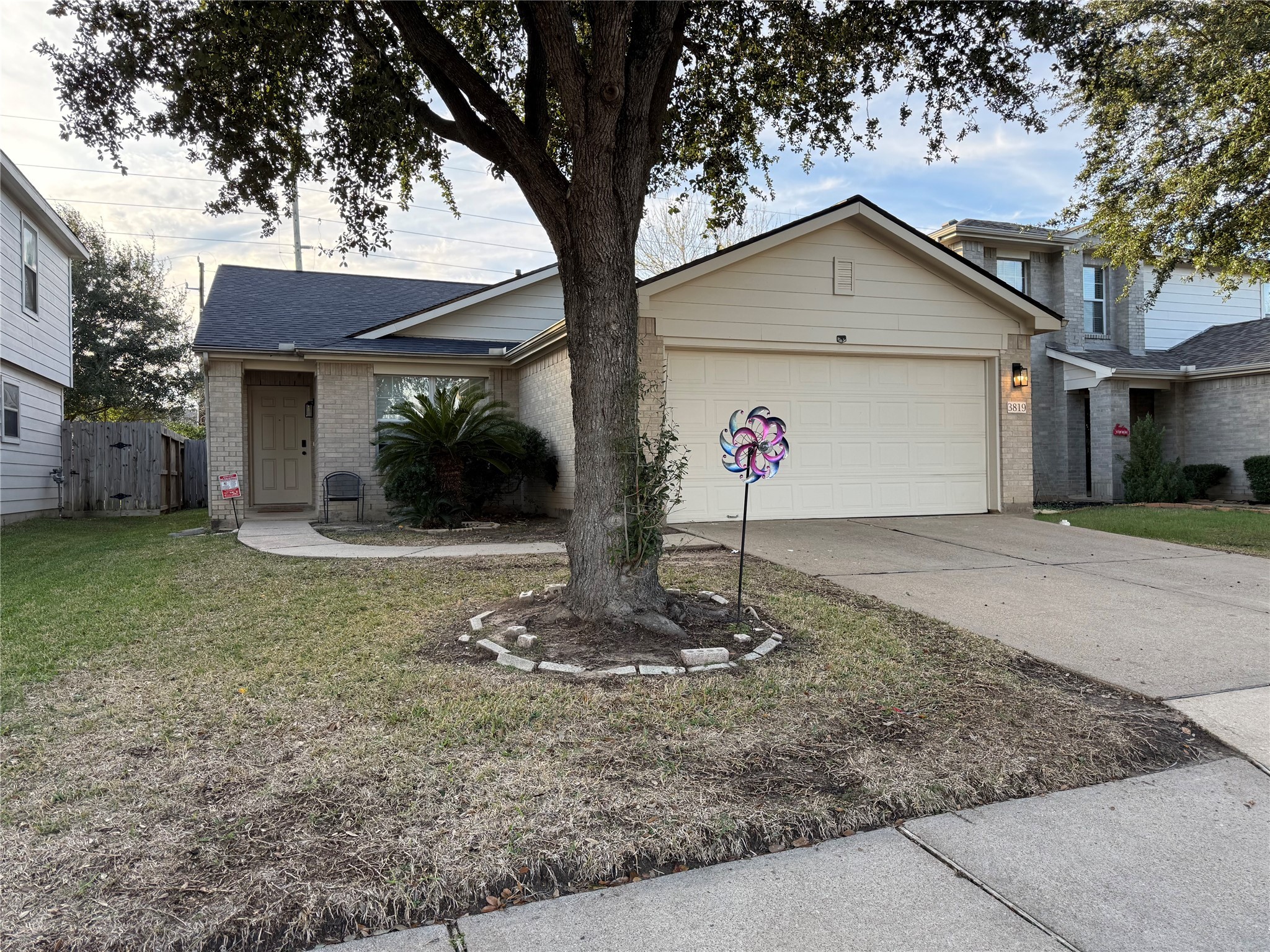3819 Banks Ridge Lane Katy, TX 77449 - Photo 2 of 19 a front view of a house with garden