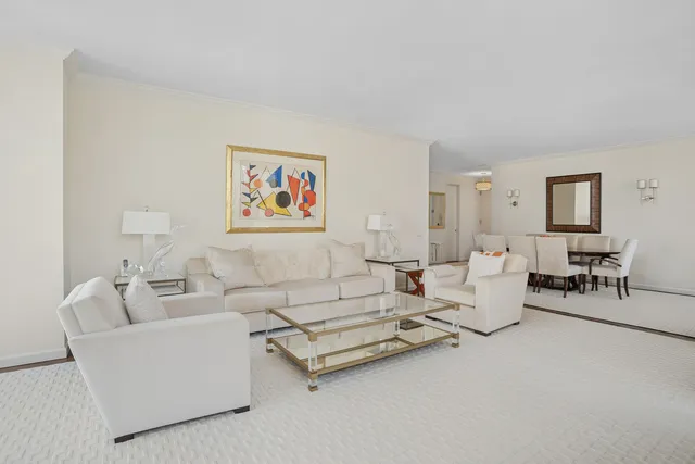 a living room with furniture and a couch