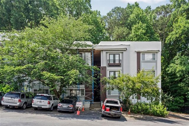 a car parked in front of a house