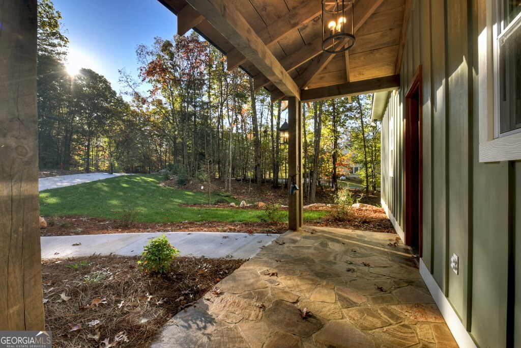 646 High Country Crossing Morganton, GA 30560 - Photo 17 of 44 a view of a porch with a backyard