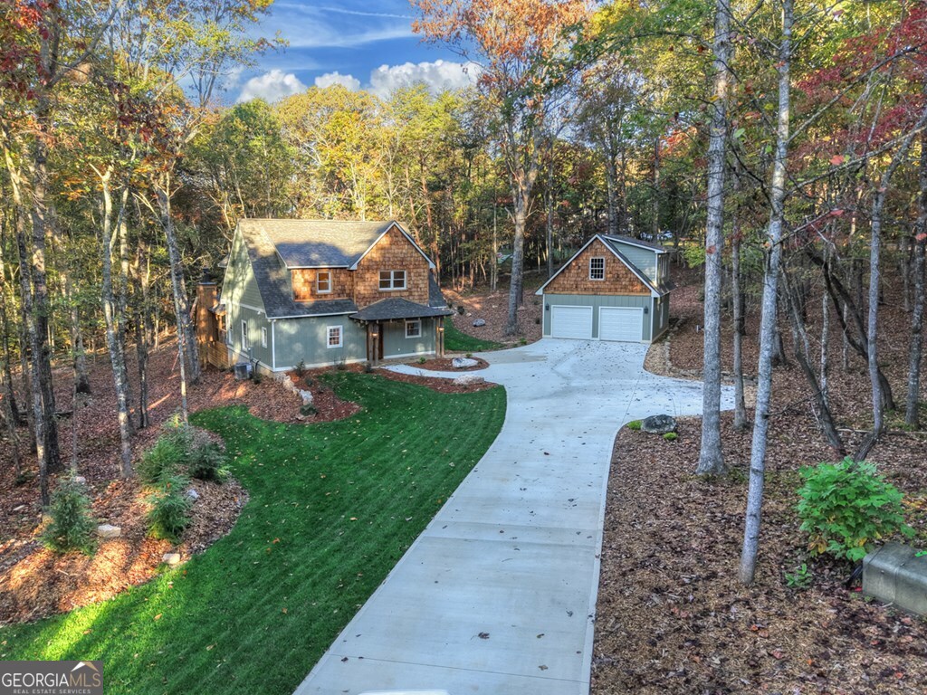 646 High Country Crossing Morganton, GA 30560 - Photo 43 of 44 a front view of a house with a yard and large tree