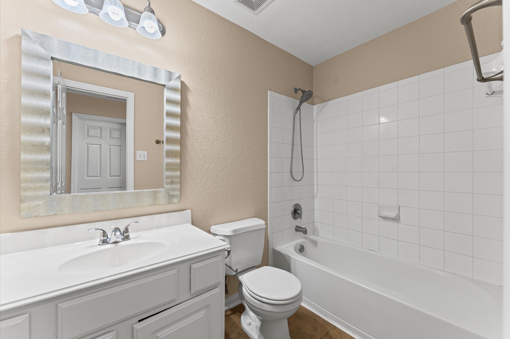 3010 Pathfinders Pass Spring, TX 77373 - Photo 15 of 26 a bathroom with a sink toilet vanity and shower