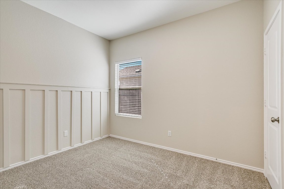 108 Akela Way Georgetown, TX 78626 - Photo 11 of 15 a view of an empty room with a window