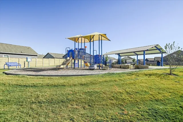 a view of swimming pool with outdoor seating