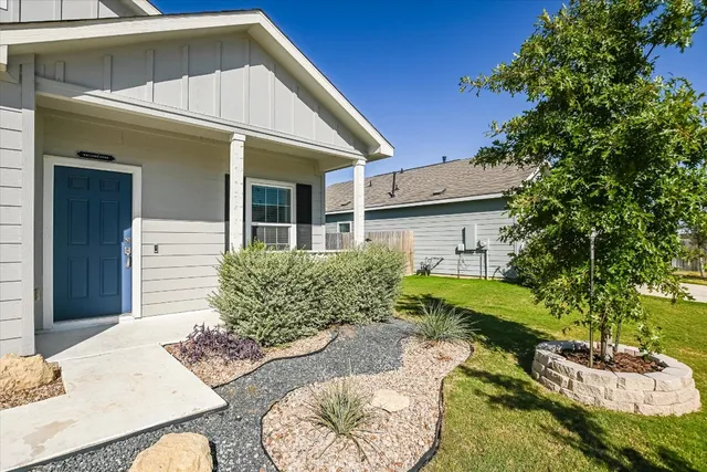 a house view with a outdoor space