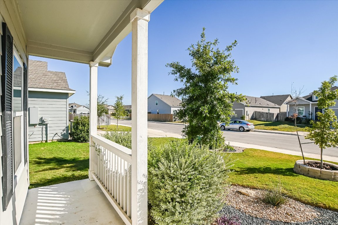 108 Akela Way Georgetown, TX 78626 - Photo 3 of 15 a house view with a garden space