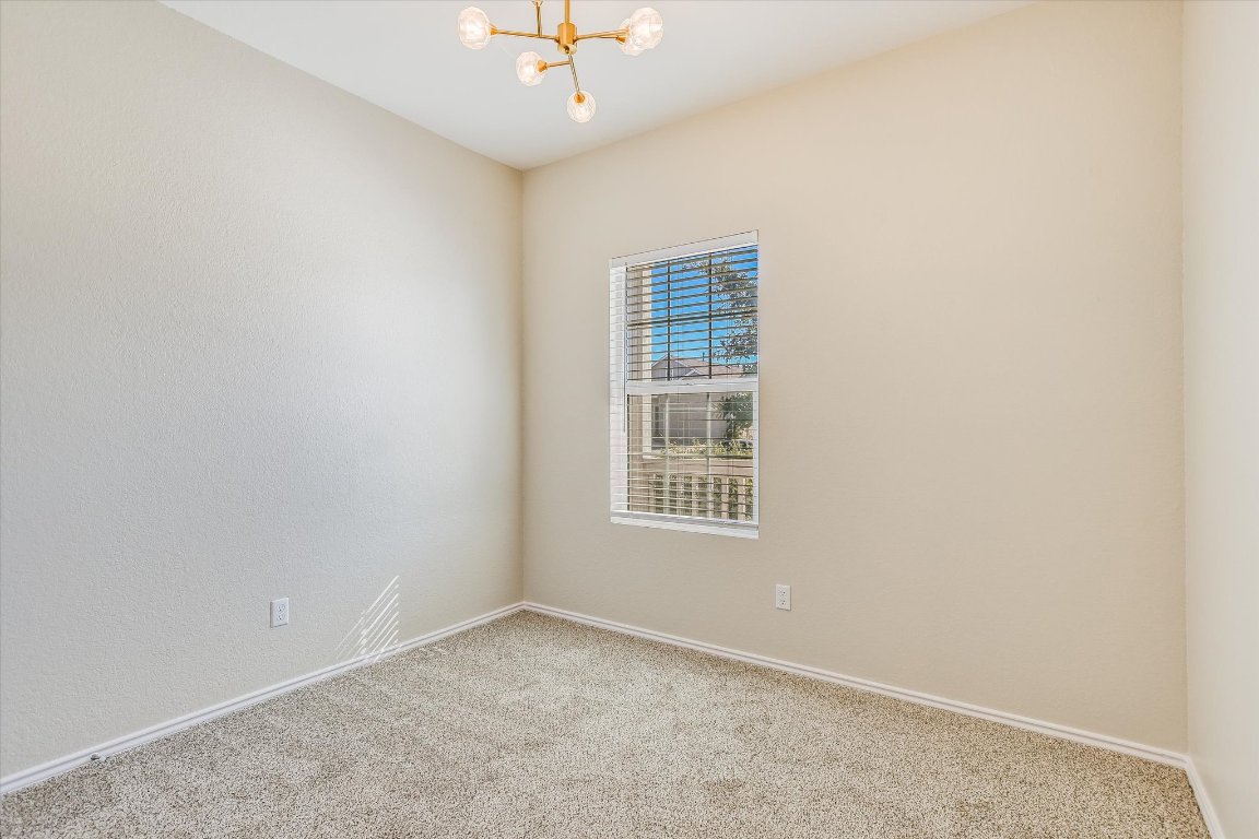 108 Akela Way Georgetown, TX 78626 - Photo 9 of 15 an empty room with a window