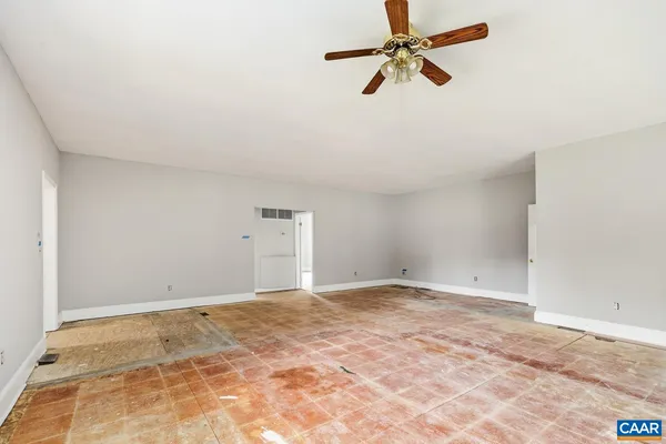 a view of a big room with carpet