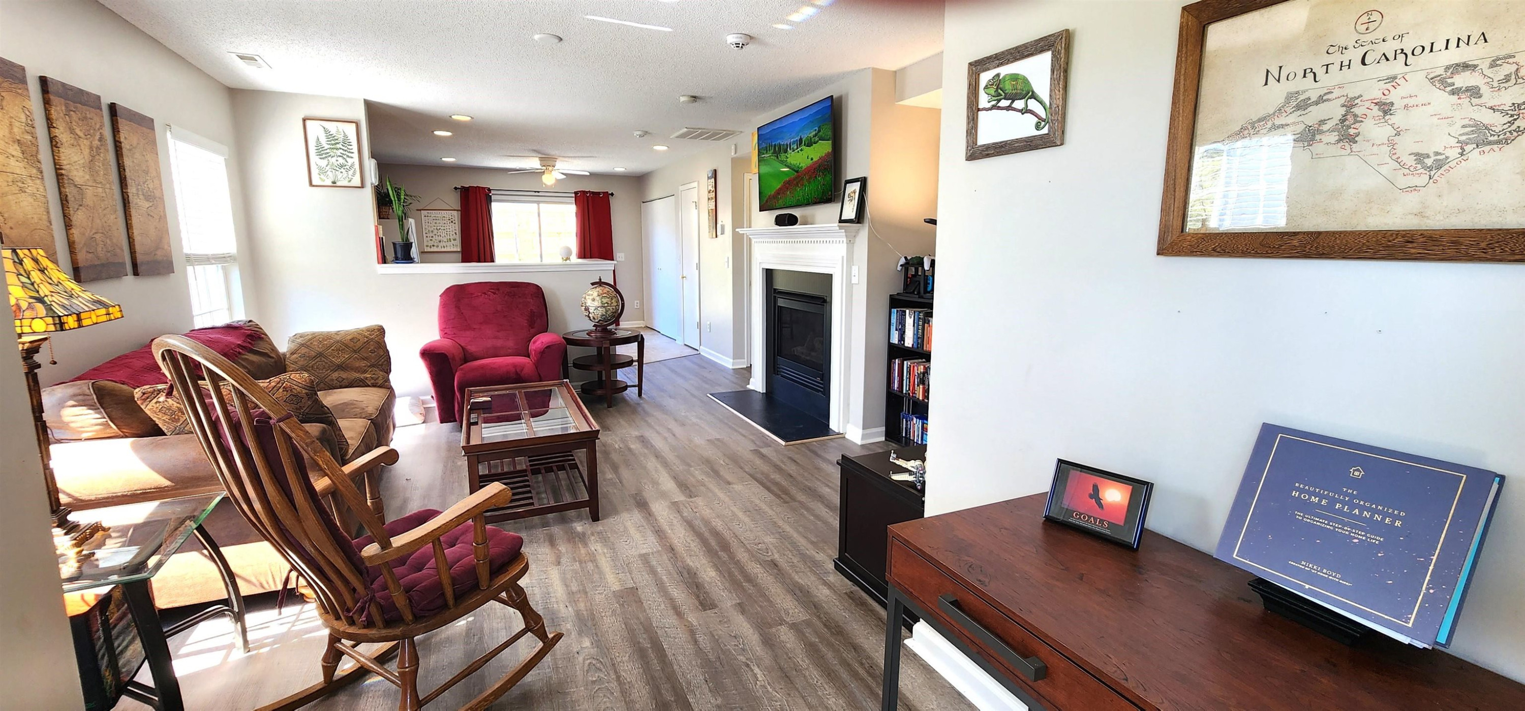 3740 Tryon Ridge Drive Raleigh, NC 27610 - Photo 2 of 20 a living room with furniture and a flat screen tv