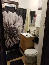 a close view of shoes stand and cabinets