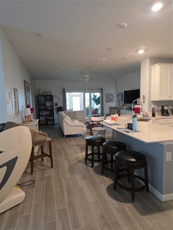 7875 Southwest 74th Street Ocala, FL 34474 - Photo 14 of 28 a room with furniture a dining table and chairs