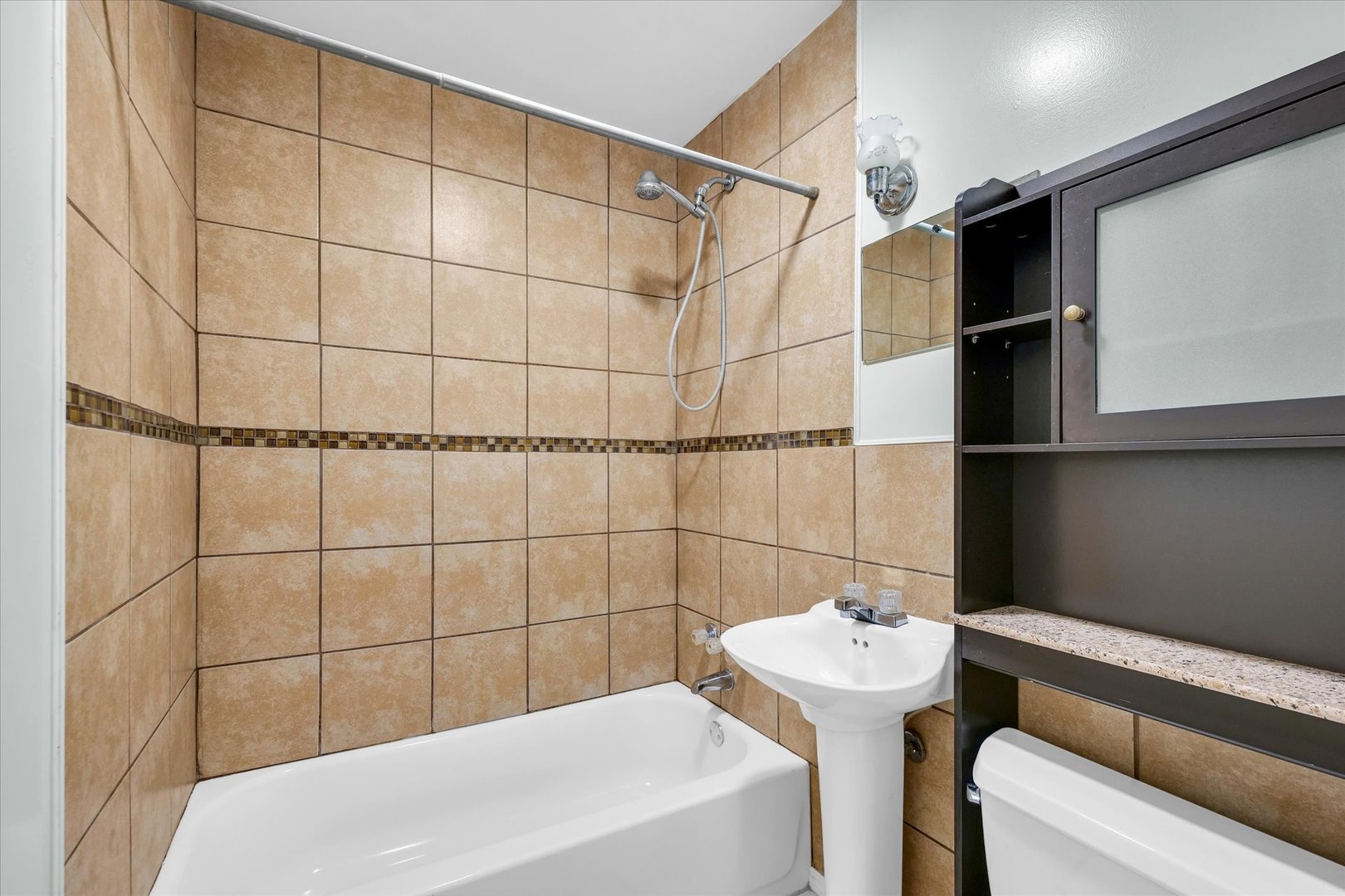 1345 Sunset Drive Rantoul, IL 61866 - Photo 17 of 22 a bathroom with a sink and toilet