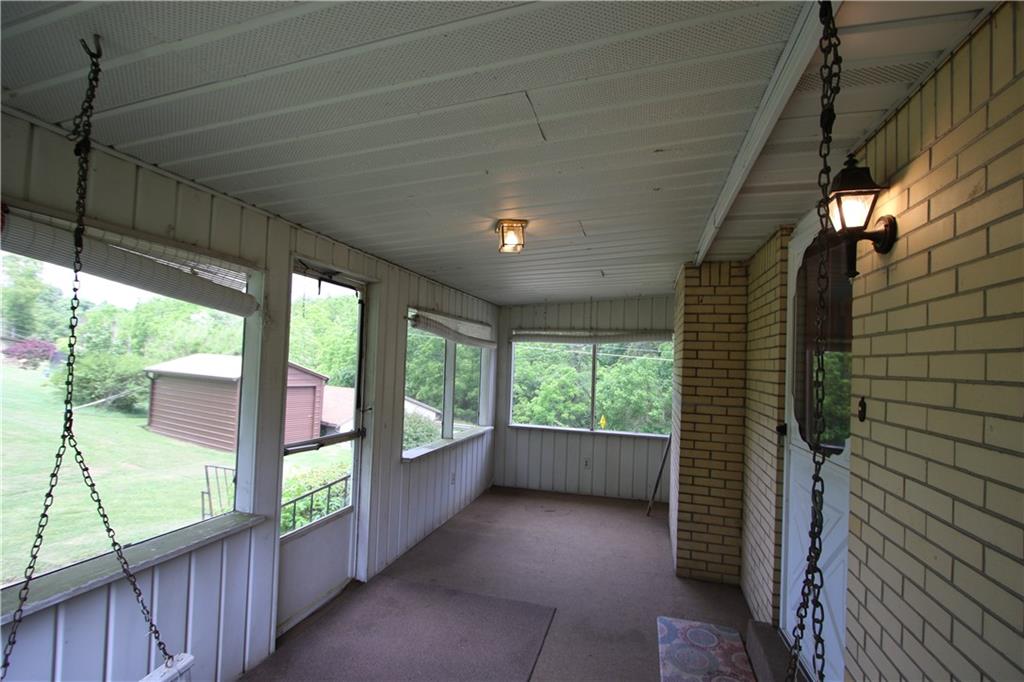 269 Rte 481 Fredericktown, PA 15333 - Photo 17 of 30 Fabulous Enclosed Sun Porch off Kitchen
