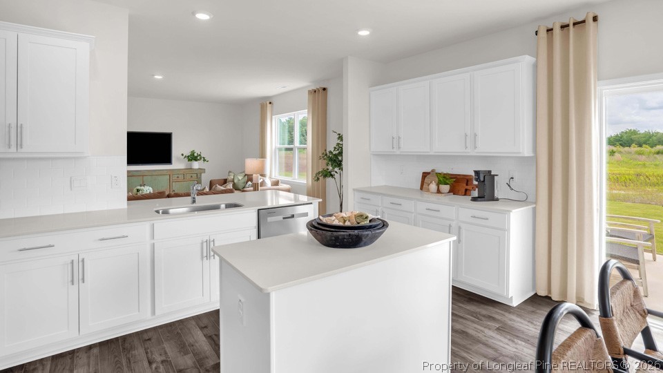 143 Rashford Way Raeford, NC 28376 - Photo 13 of 33 a kitchen with a sink and a stove top oven
