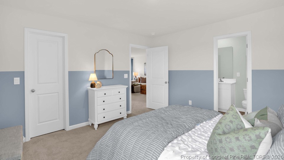 143 Rashford Way Raeford, NC 28376 - Photo 25 of 33 a bedroom with a bed and a dresser