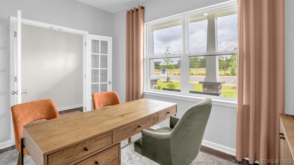 143 Rashford Way Raeford, NC 28376 - Photo 4 of 33 a dining room with furniture and window