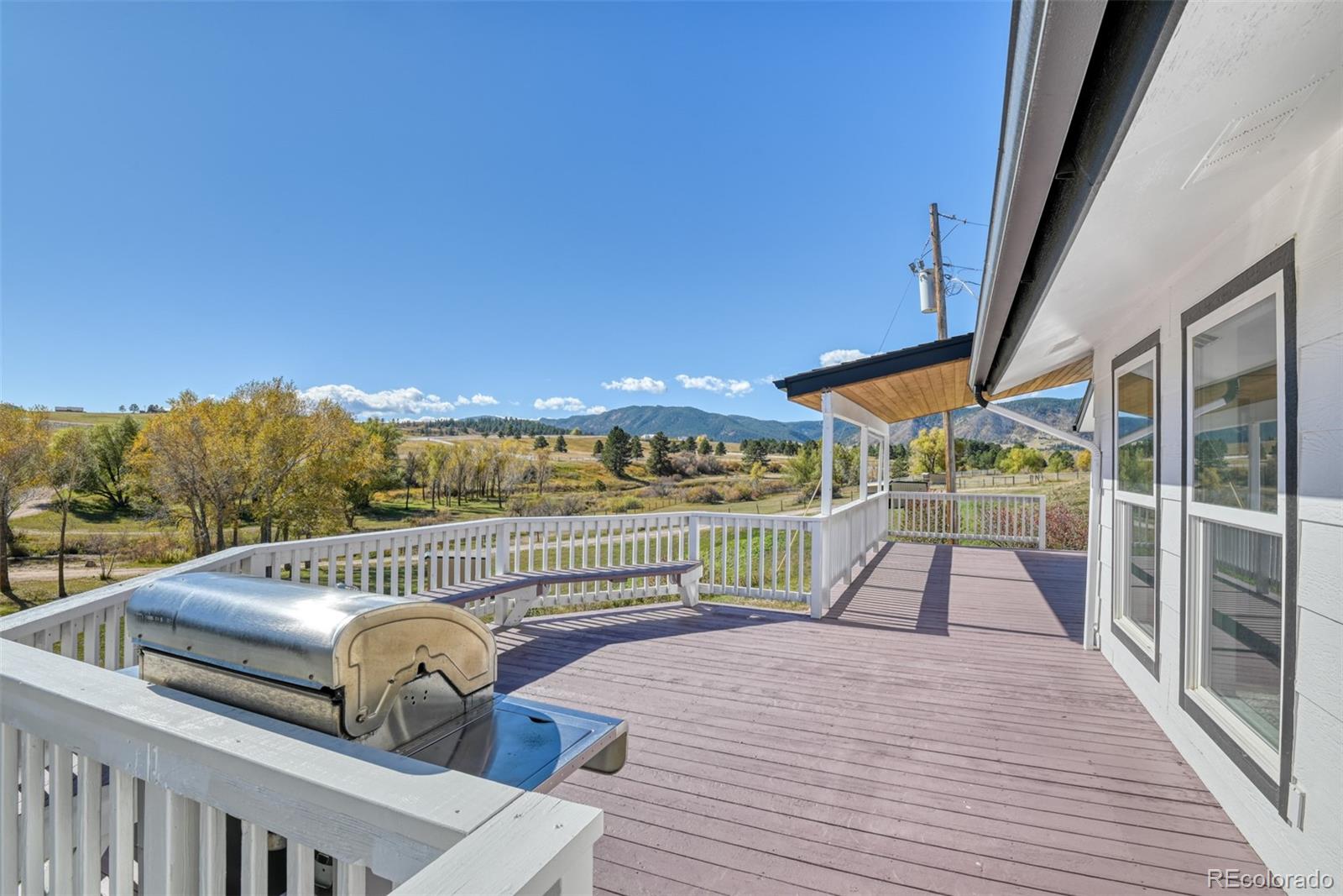 850 West Fox Farm Road Larkspur, CO 80118 - Photo 23 of 50 a view of balcony with deck