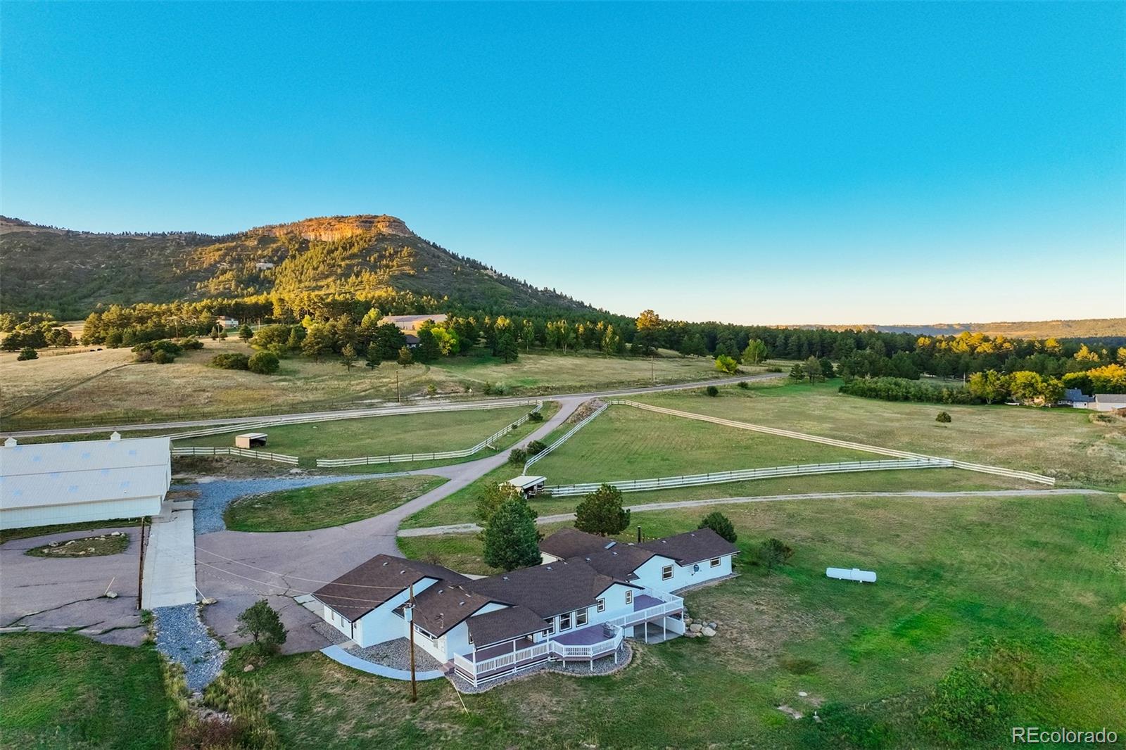 850 West Fox Farm Road Larkspur, CO 80118 - Photo 41 of 50 a view of a tennis court