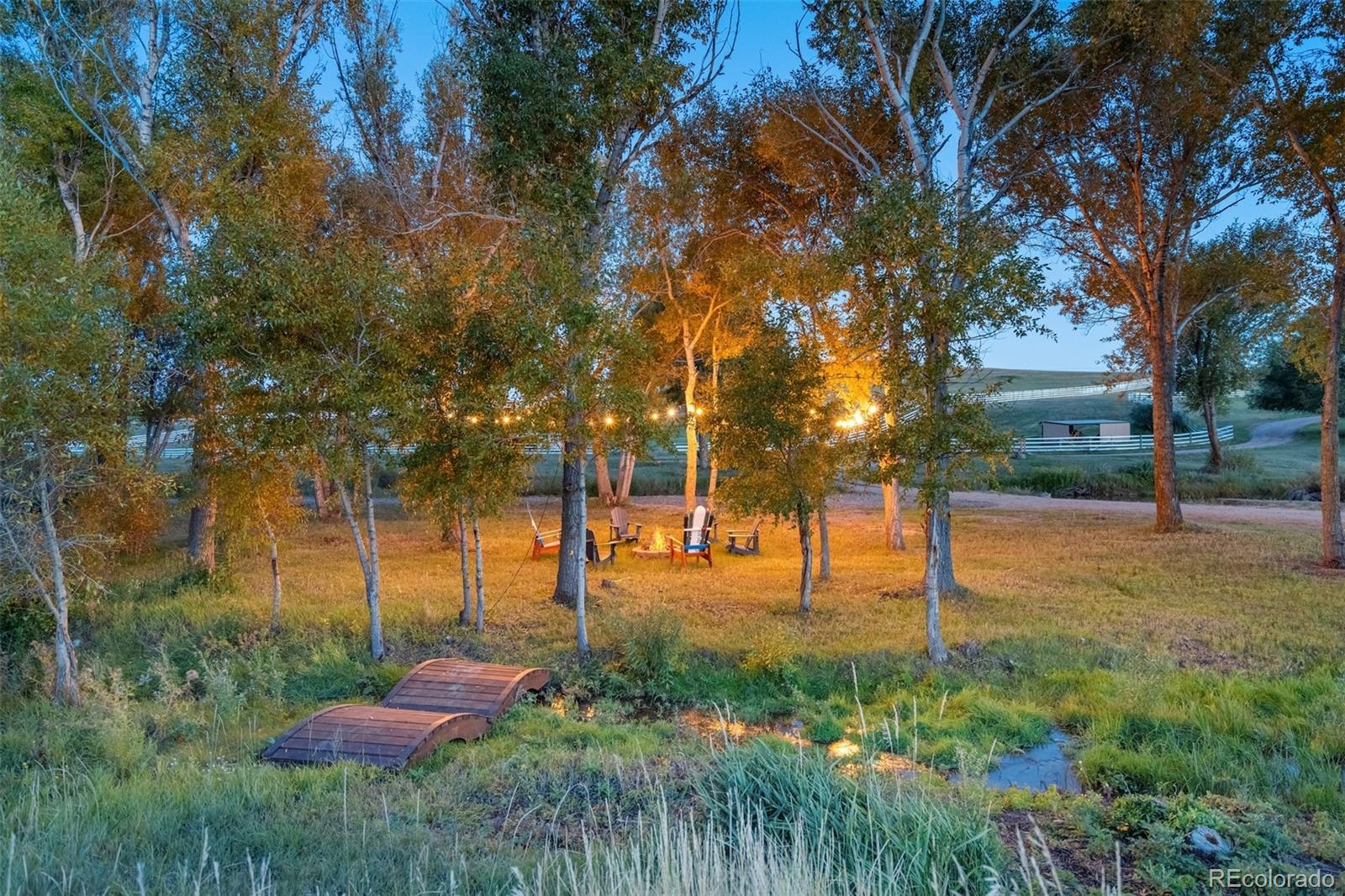 850 West Fox Farm Road Larkspur, CO 80118 - Photo 48 of 50 a view of a backyard
