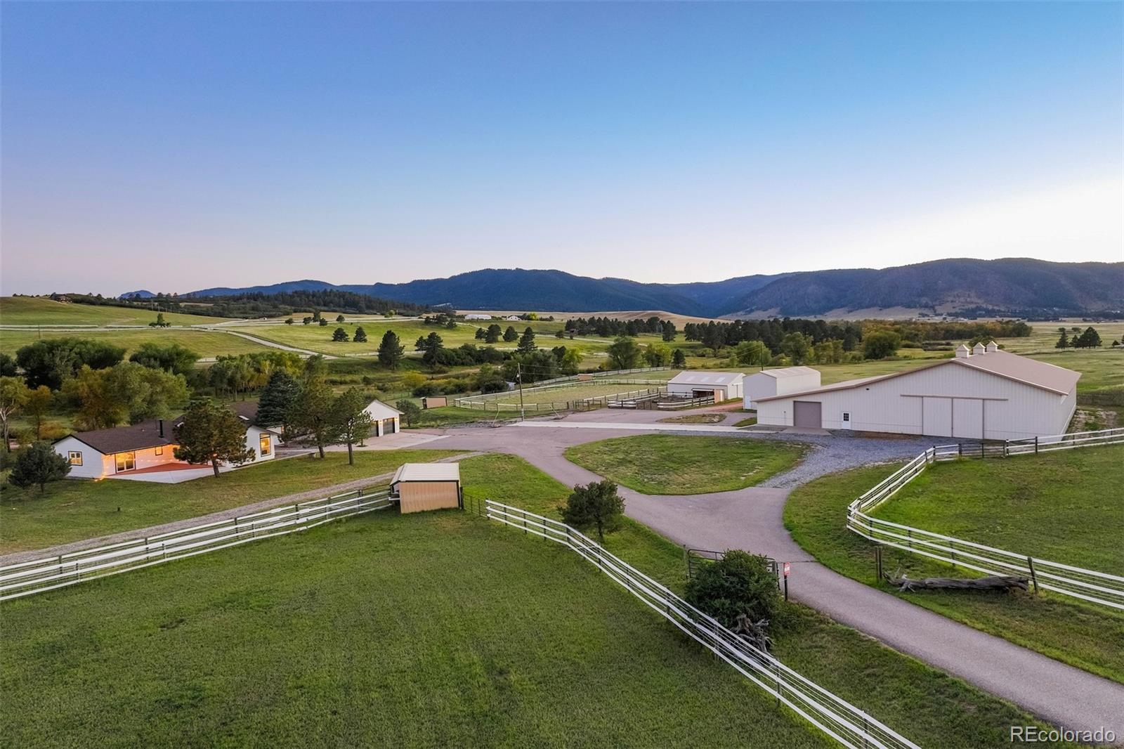 850 West Fox Farm Road Larkspur, CO 80118 - Photo 5 of 50 a view of an outdoor space yard lake view and mountain view