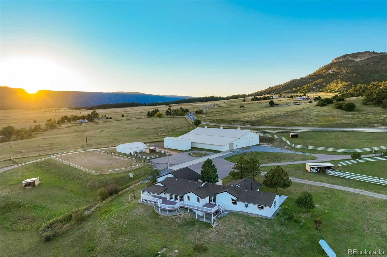 850 West Fox Farm Road Larkspur, CO 80118 - Photo 6 of 50 an aerial view of a house with a garden