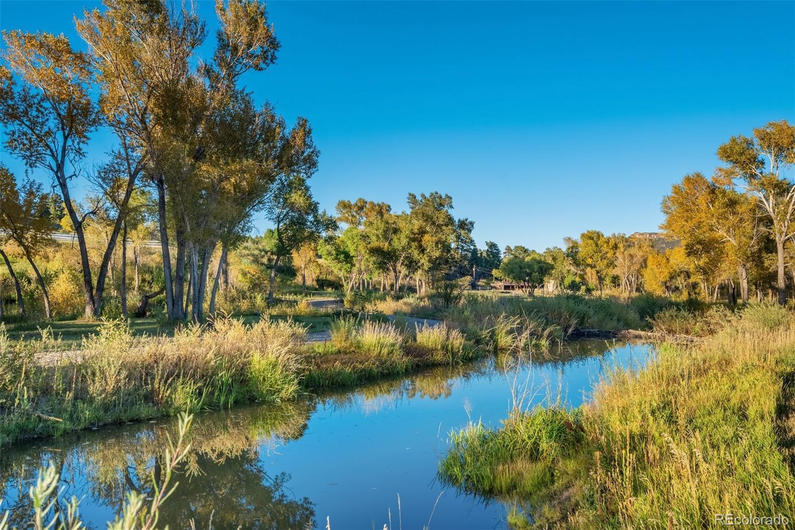 850 West Fox Farm Road Larkspur, CO 80118 - Photo 7 of 50 a view of lake