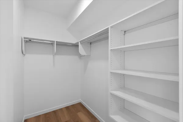 a view of an empty walk in closet