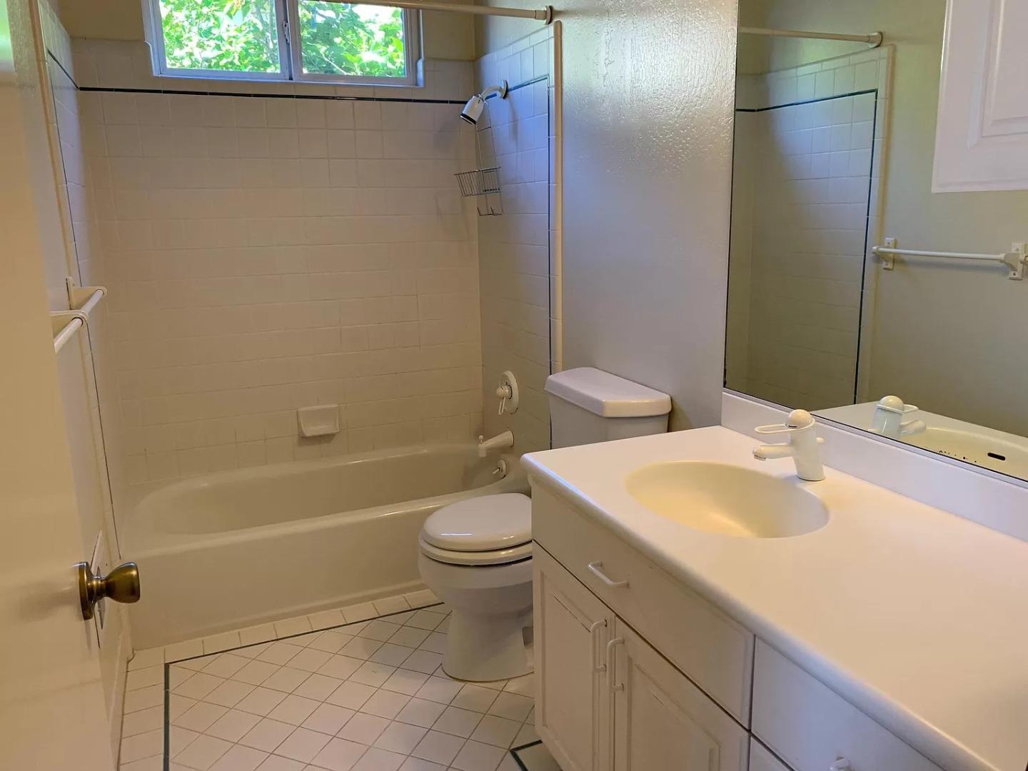 1170 Oakwood Drive Millbrae, CA 94030 - Photo 10 of 13 a bathroom with a sink a toilet and shower