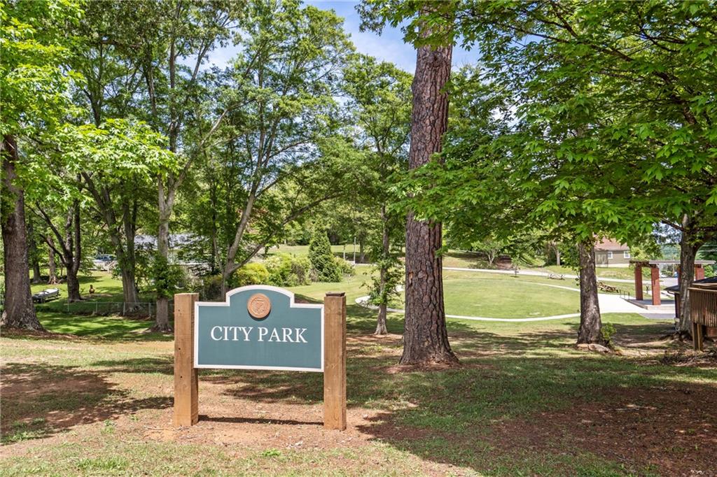 660 Groover Street Ball Ground, GA 30107 - Photo 51 of 53 a sign board on the side of the road