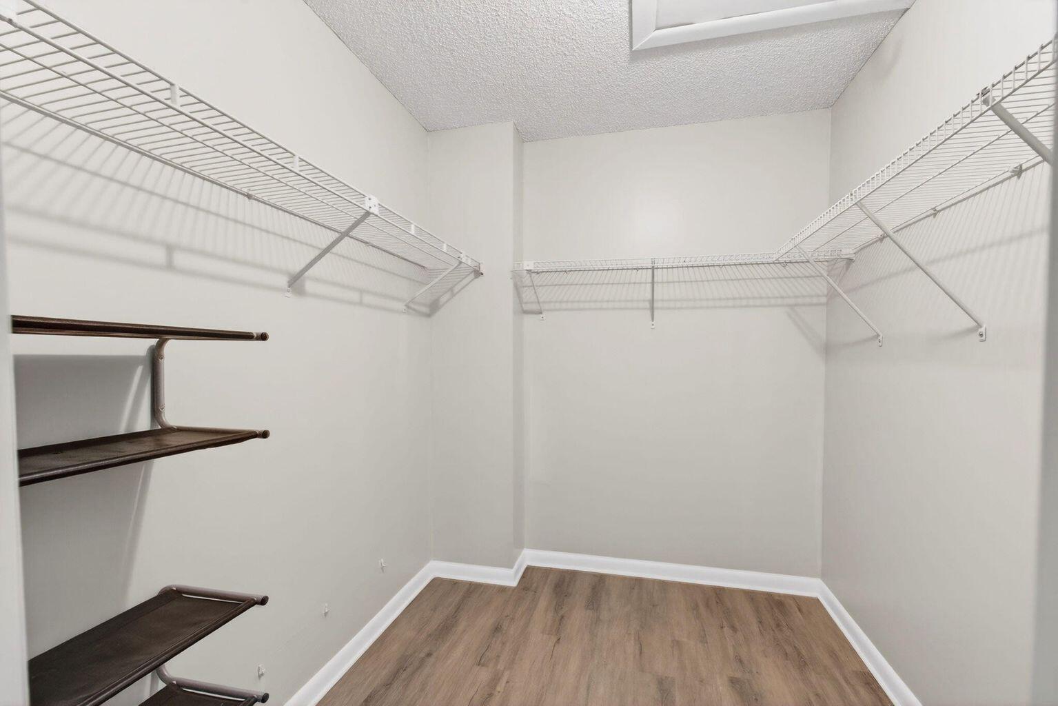 400 Club Circle, Unit 201 Boca Raton, FL 33487 - Photo 48 of 64 a view of a room with racks on the wall