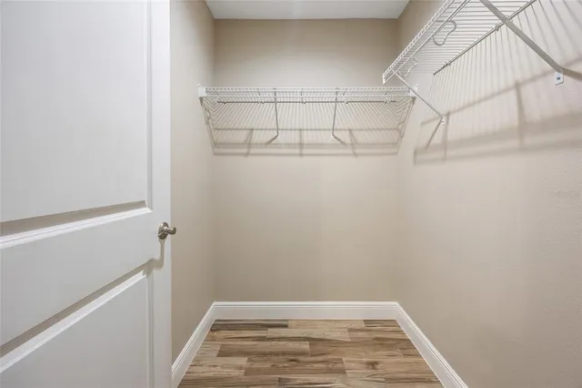 a view of a room with racks on the wall