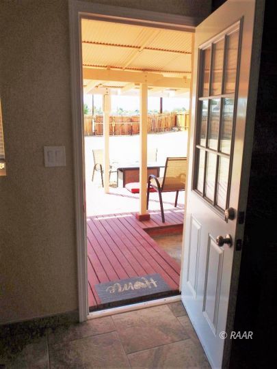 437 North Fairview Street Ridgecrest, CA 93555 - Photo 29 of 35 a view of a room with wooden floor and furniture