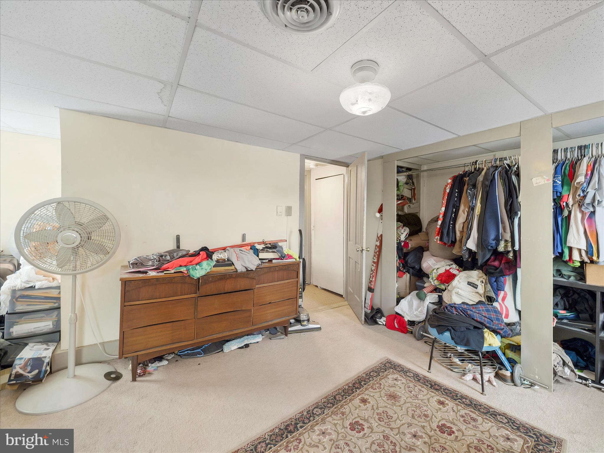 13643 Creek View Drive Clear Spring, MD 21722 - Photo 15 of 49 a room with gym equipment and a chandelier
