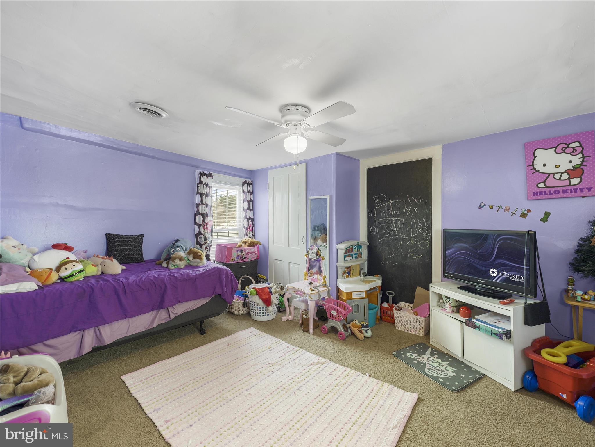 13643 Creek View Drive Clear Spring, MD 21722 - Photo 30 of 49 a bed room with furniture and a flat screen tv