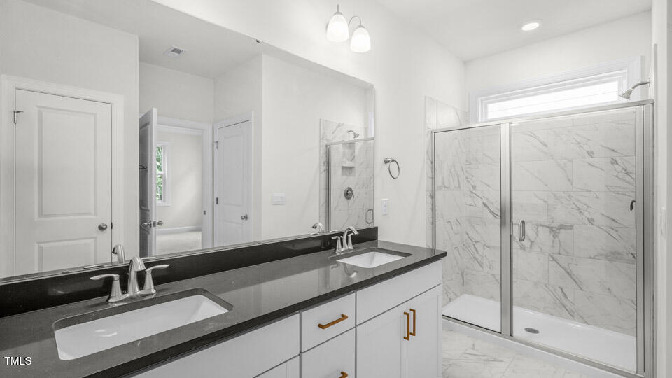 7573 Percussion Drive Apex, NC 27539 - Photo 26 of 39 Bathroom