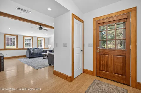 a view of a livingroom with furniture and wooden floor