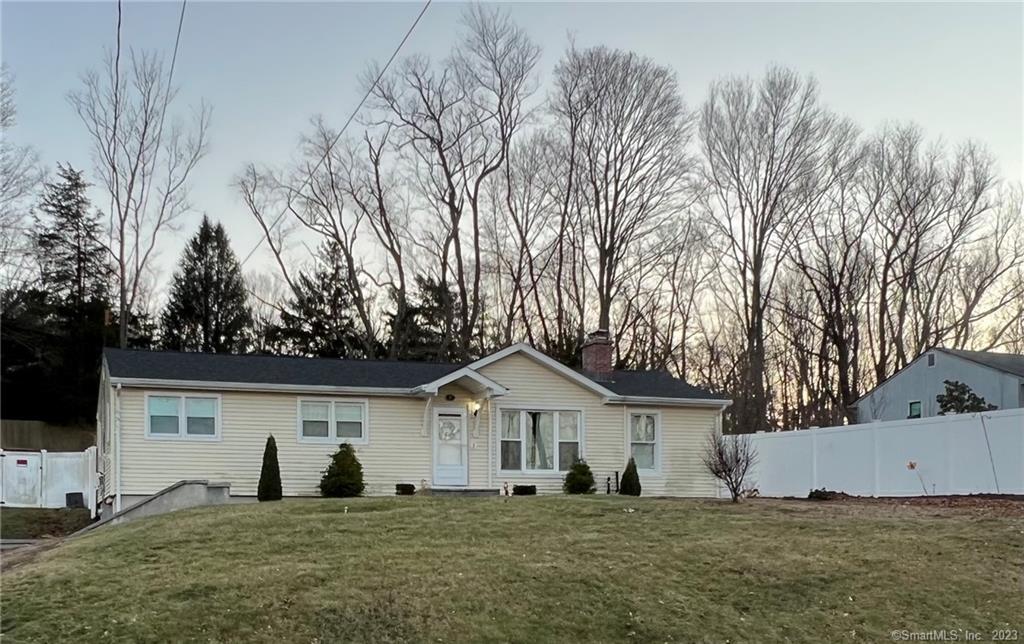 6 Williams Road North Branford, CT 06471 - Photo 1 of 1 a house that is sitting in the middle of a field