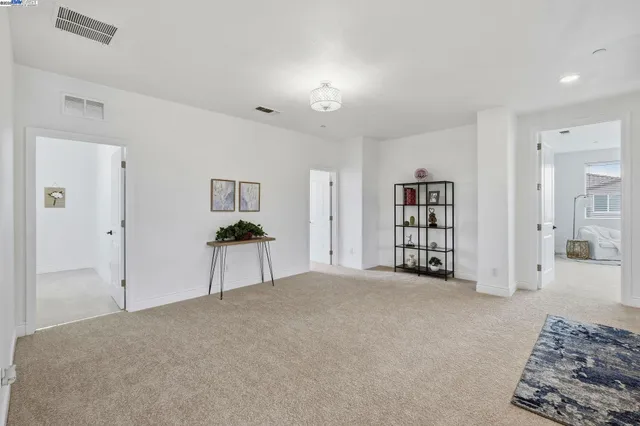 a view of a livingroom with a workspace