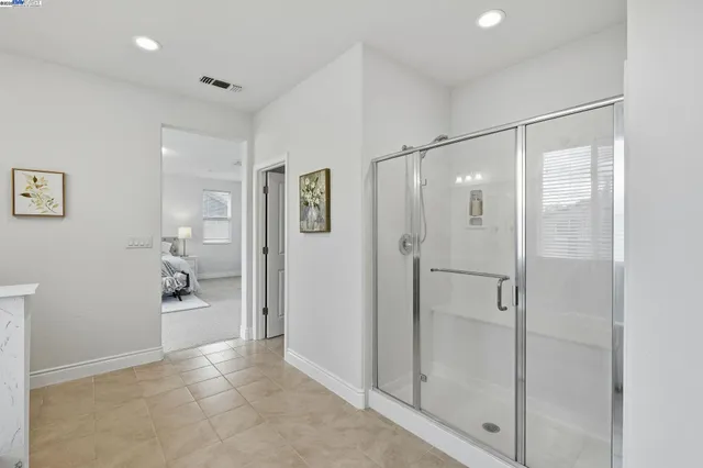 a view of a bathroom with shower