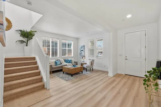 a living room with furniture and garden