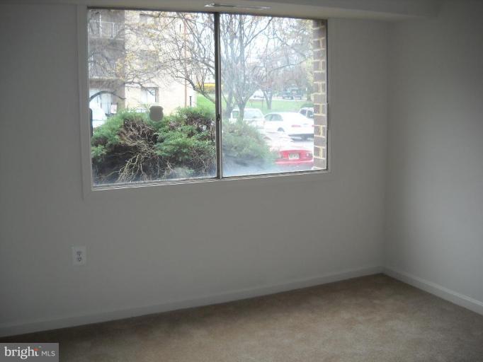 3814 Bel Pre Road, Unit 359 Silver Spring, MD 20906 - Photo 3 of 8 a view of empty room with window
