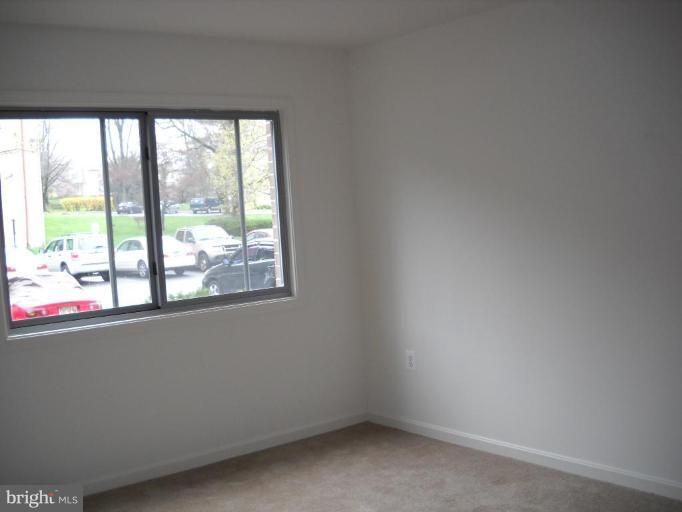 3814 Bel Pre Road, Unit 359 Silver Spring, MD 20906 - Photo 4 of 8 an empty room with a window