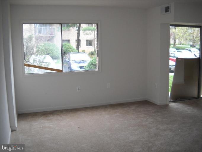 3814 Bel Pre Road, Unit 359 Silver Spring, MD 20906 - Photo 7 of 8 an empty room with a window