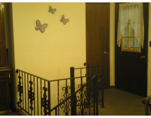 708 Sechler Road Somerset, PA 15501 - Photo 15 of 17 Other. Spiral staircase from kitchen to lower level