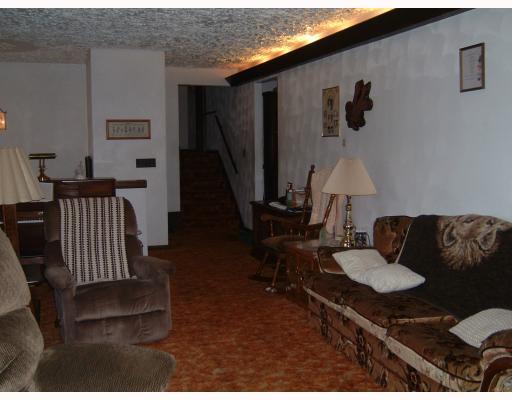 708 Sechler Road Somerset, PA 15501 - Photo 9 of 17 Living Room. Living room with reflective lights