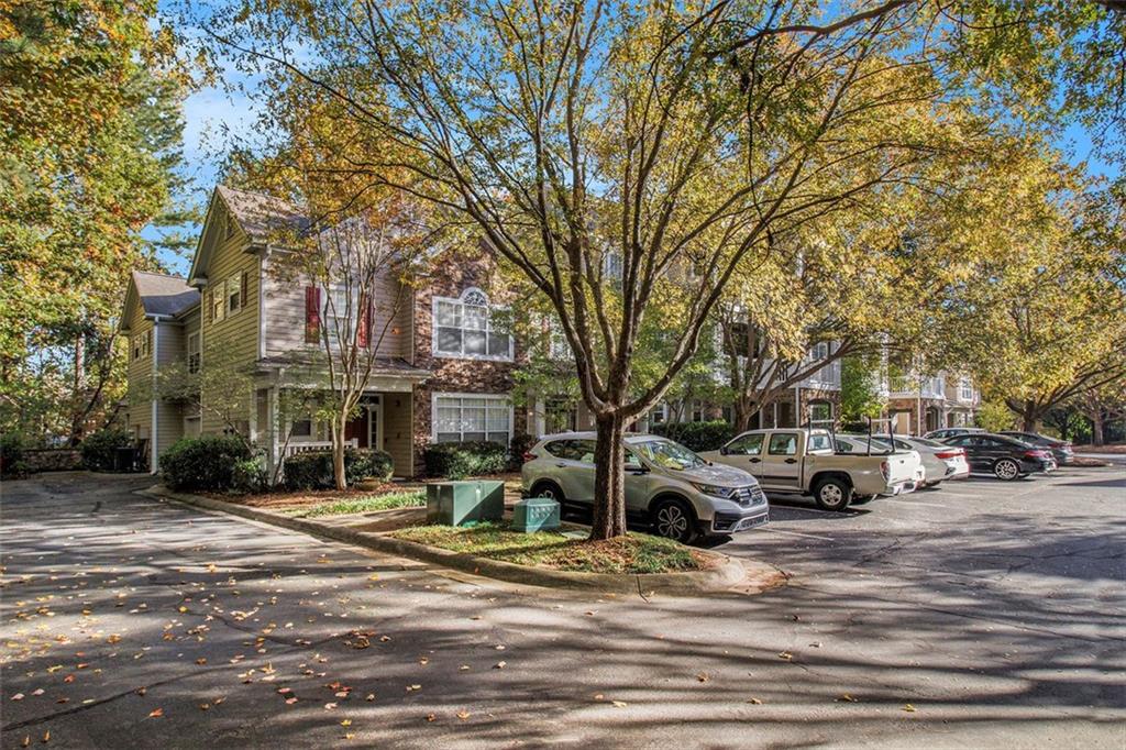 a view of street with parked cars