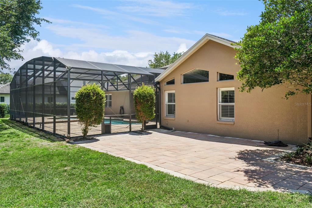 2230 Ridgewind Way Windermere, FL 34786 - Photo 38 of 38 a view of a house with a yard and a garden