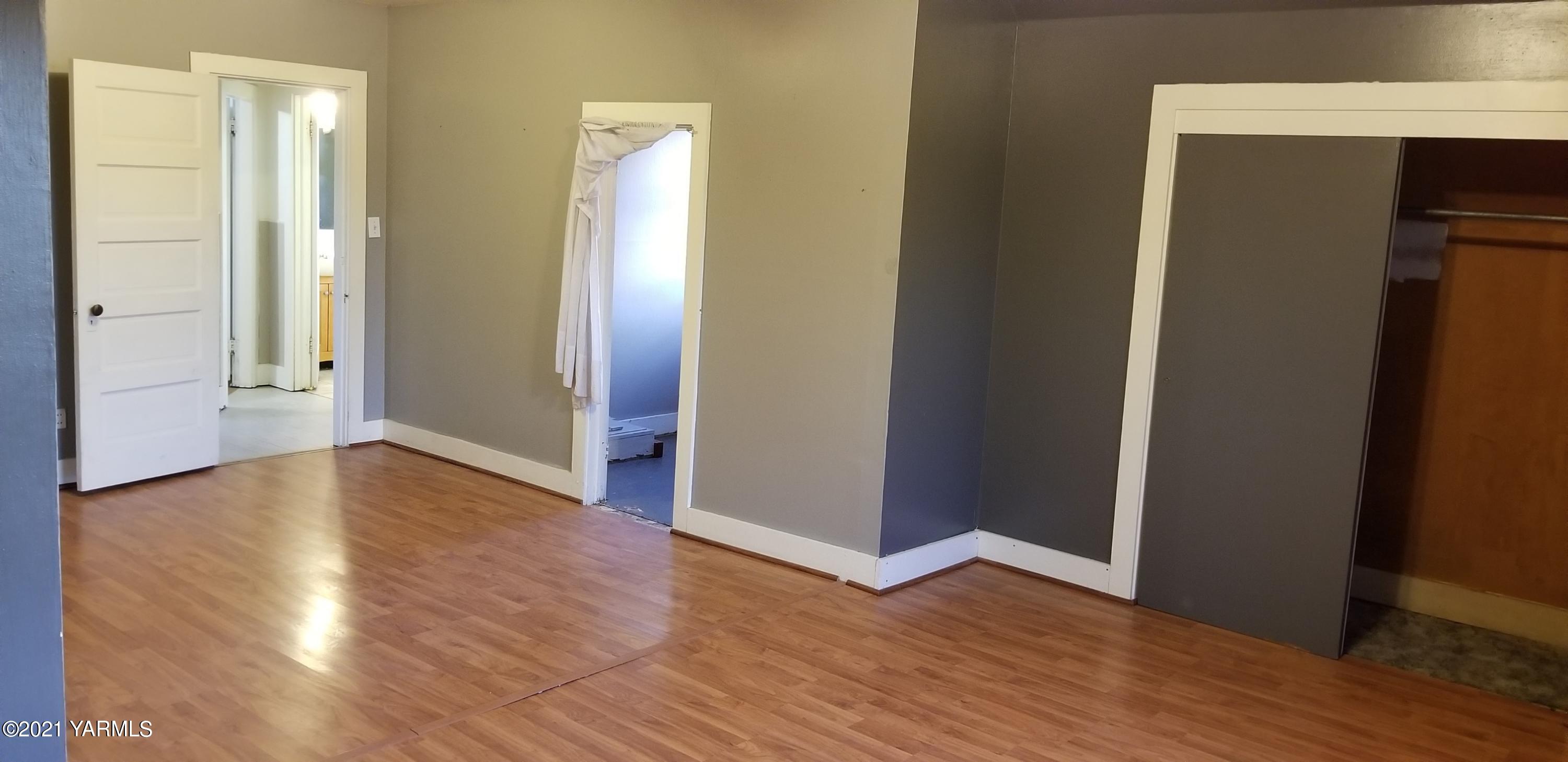 753 Wesley Road White Swan, WA 98952 - Photo 27 of 30 a view of an empty room with wooden floor