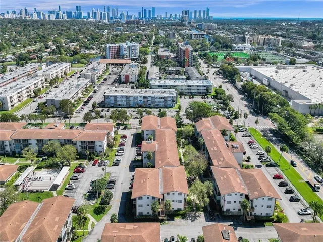 an aerial view of a city with lots of residential buildings